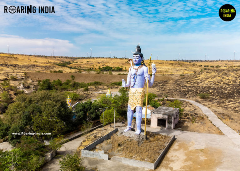Side view of Harneshwar Shiva Statue, Raywadi
